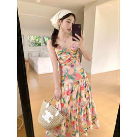 茶歇法式油画碎花吊带连衣裙子女装夏季2026新款海边度假沙滩长裙