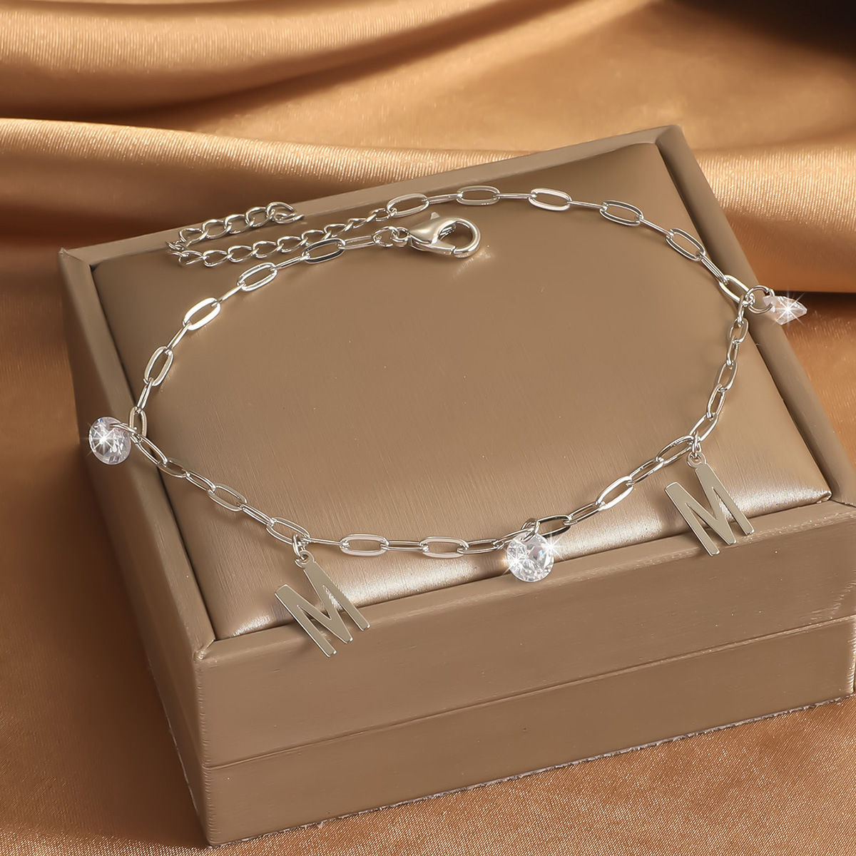 Zircon de cobre Europa y América mariposa transfronteriza amor colgante cadena de metal tobillas de brillo moda femenina personalidad nicho pie joyería