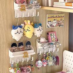 キーホルダーのストラップの展示棚の穴を開けないでフックして収納棚の壁の通用するタイプの簡単な収納のごみの専用の棚を掛けます。