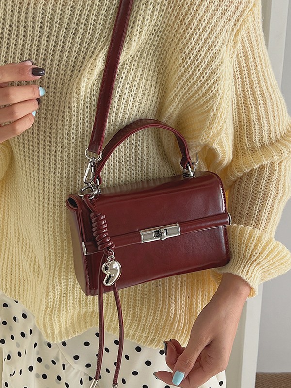 Bolso de mano de alta sensación para mujeres 2026 nuevo bolso cuadrado ligero de textura de lujo estilo coreano nicho bolso de hombro de mujer