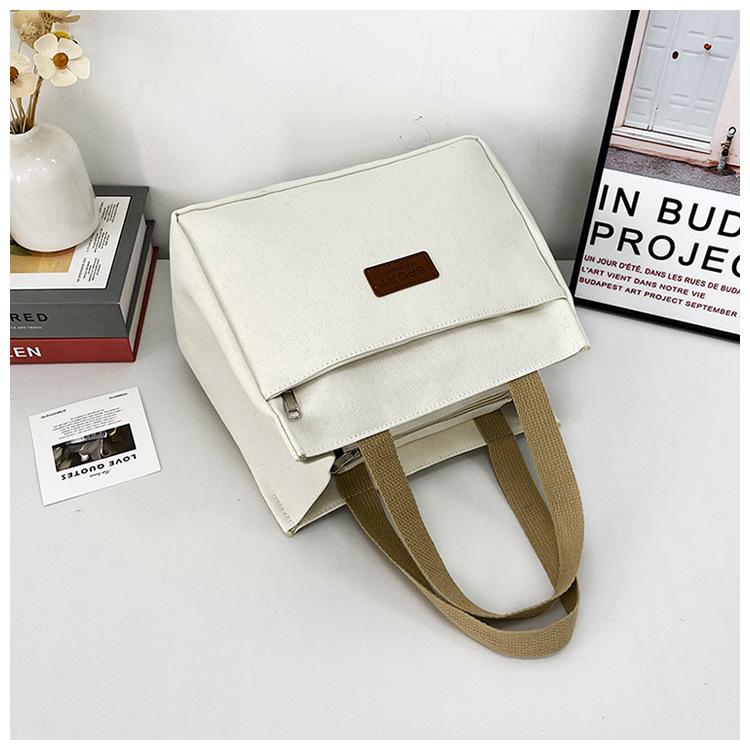 New wholesale fashionable and high-quality canvas handbag, simple and portable, easy to carry for going out, versatile lunch box and bento bag undefined