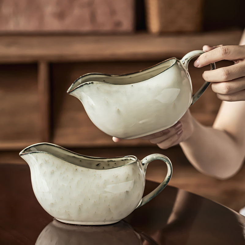Olla de cerámica de boca afilada creativa Botella de agua de gran capacidad para el hogar retro japonés Botella de agua fría al por mayor Tetera de restaurante Juego de té Bola