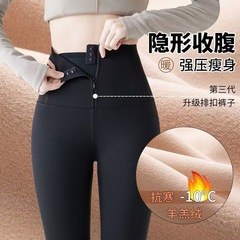 ジッパーで腹を閉じたサメのズボンの女性は秋の冬にベルベットを着てズボンを厚くして腰を上げて尻を伸ばしたバービーのズボンを着た