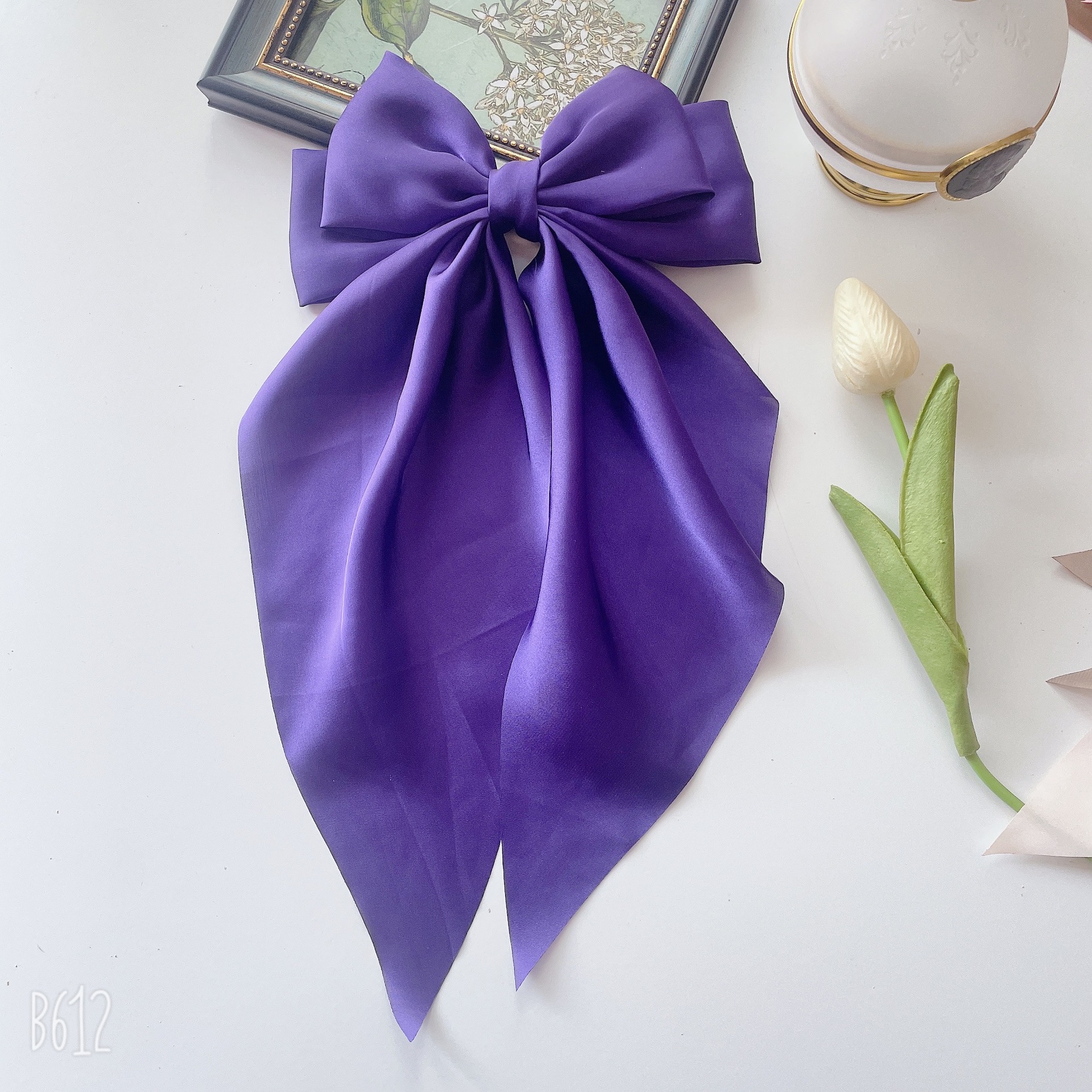 紫色蝴蝶结飘带