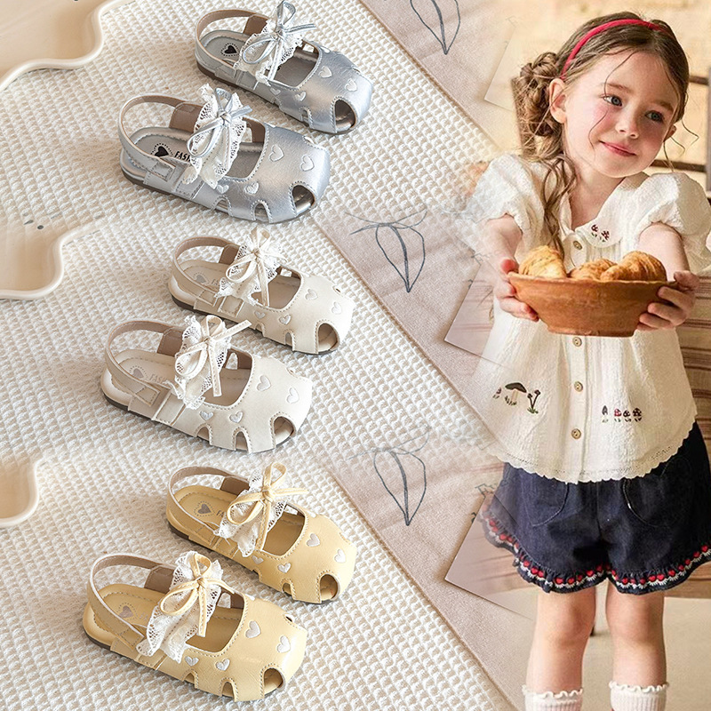 Sandálias huecas para niños 2026 verano nuevo estilo de moda para niñas zapatos de cabeza de bolsillo único para niños zapatos de princesa de arco