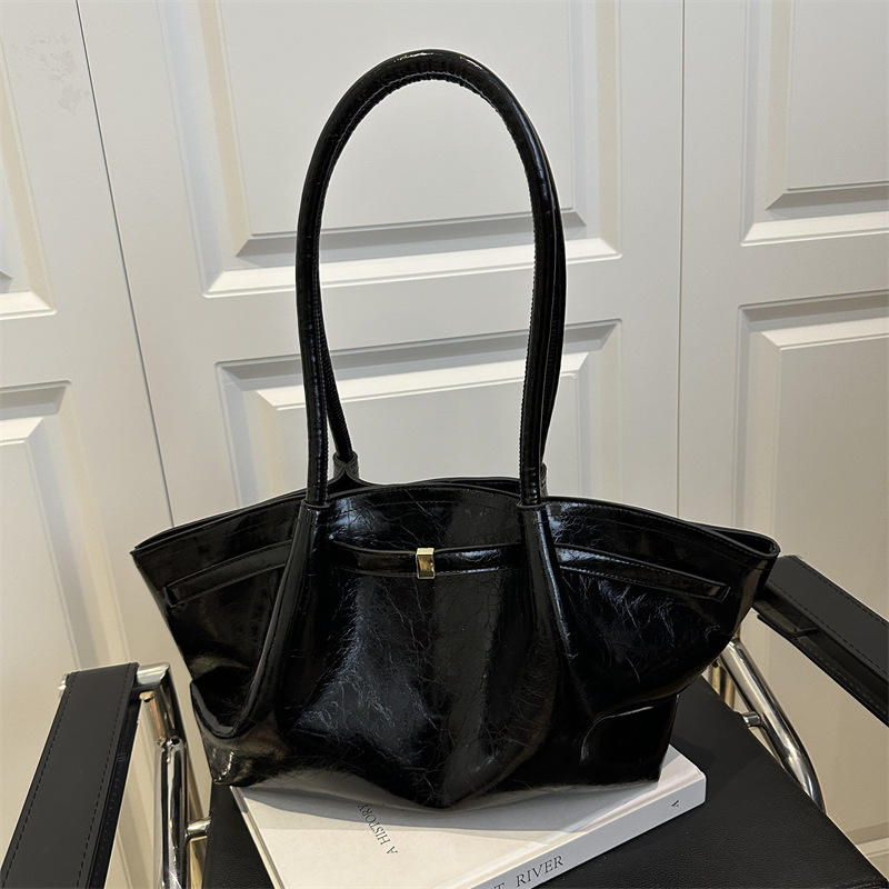 Bolsos de gran capacidad para mujer verano todo fósforo 2025 nuevo bolso de axila de un solo hombro de nicho de ocio bolso de viaje plisado