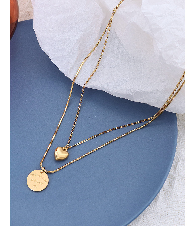 Collier double couche cœur disque en acier titane doré_voghion.com