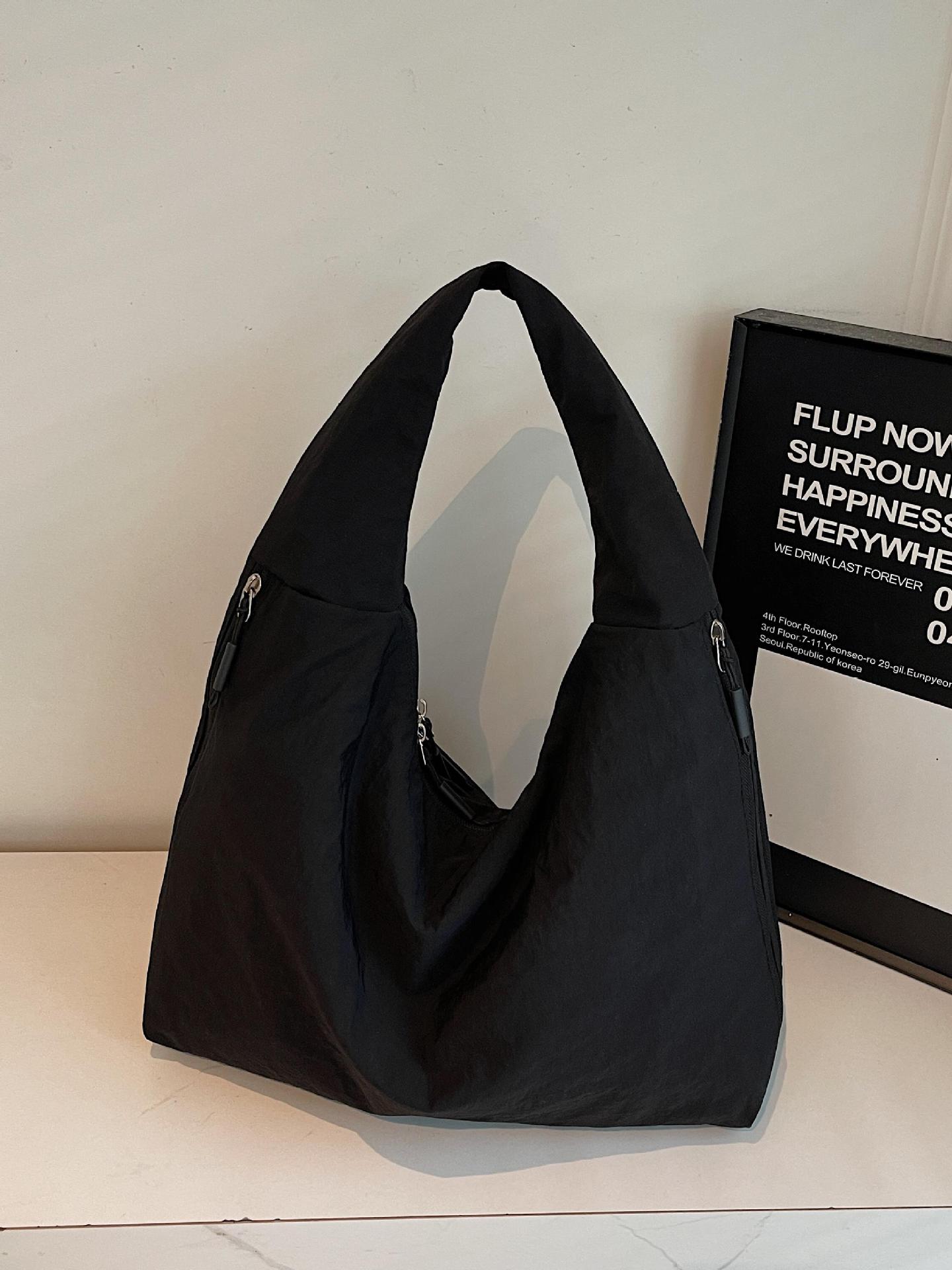 Bolsa de brazo de tela de nylon transfronteriza para mujeres 2025, nueva bolsa de hombro casual simple, bolsa de torneo casual universal