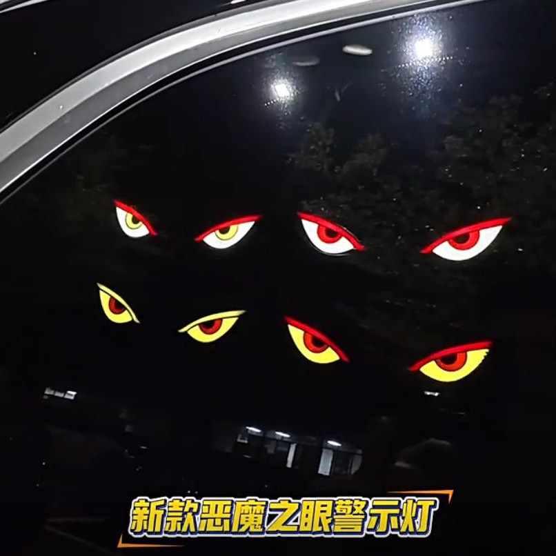 Nuevo parpadeo dinámico de ojos del diablo lámpara solar de automóvil ventana trasera LED flexible decoración de ventana triangular de advertencia