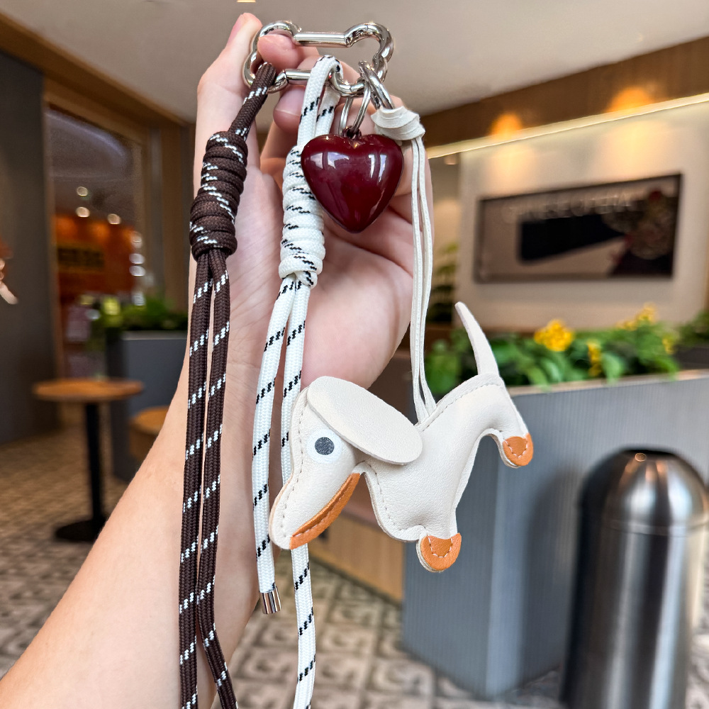 Nuevos productos transfronterizos creativos de letras de color cuerdas trenzadas llavero amor dibujos animados accesorios de diseño bolsos colgantes