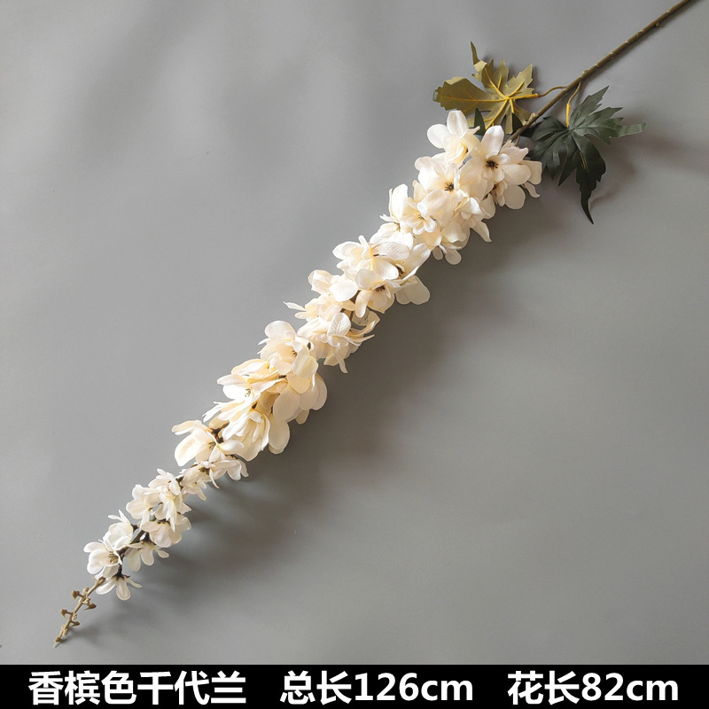 シャンパン色の結婚式の花の花の花の材料の結婚祝いの装飾の花の講堂の装飾の花のプラスチックの花の道は花の造花を導いています。|undefined