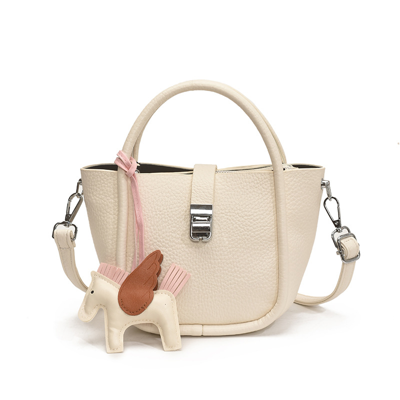 Bolso de cubo para mujer, tendencia transfronteriza de alta gama, bolso de mano con patrón de lichi, viaje diario, bolsa de mensajero de canasta de verduras de estilo occidental