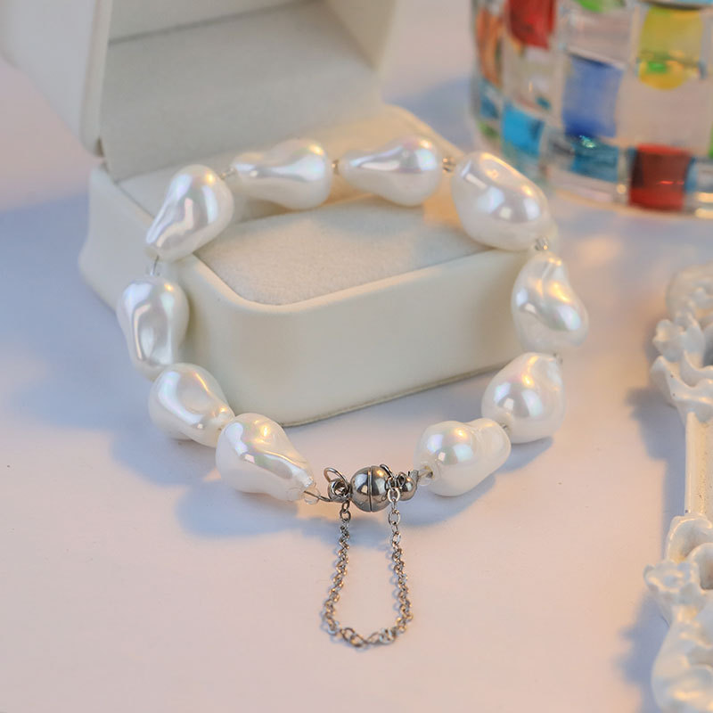 Nuevos productos de alto nivel imitación barroco pulsera de perlas nicho diseño ligero lujoso flujo de cuentas pulsera de pulsera de absorción magnética exquisita
