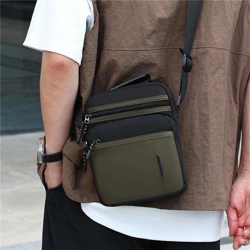 Otoño y invierno nuevo tipo de bolso de hombro de hombre, bolsa de moda multicapa de almacenamiento, bolso de mano simple de negocios de Oxford