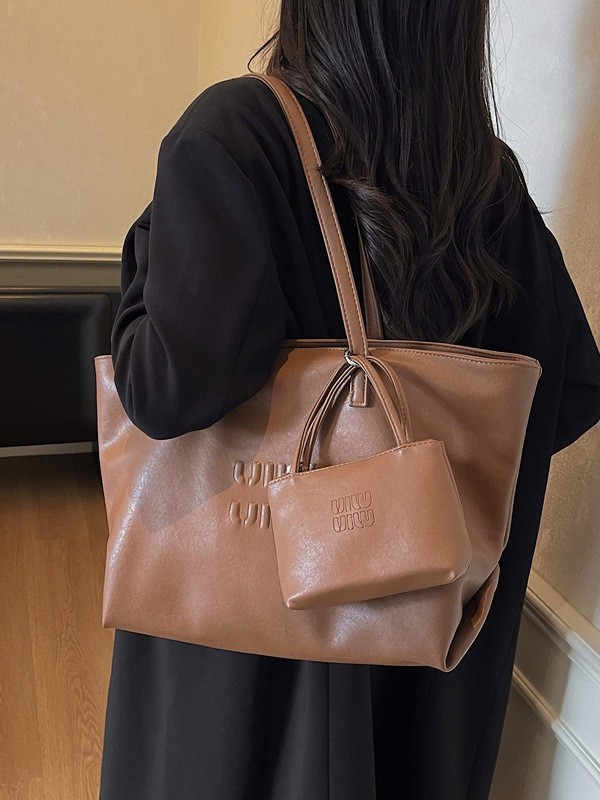 Bolso coreano nicho Zhong tote simple nuevo ocio de gran capacidad alta sensación práctica hombro axilar bolsa de viaje