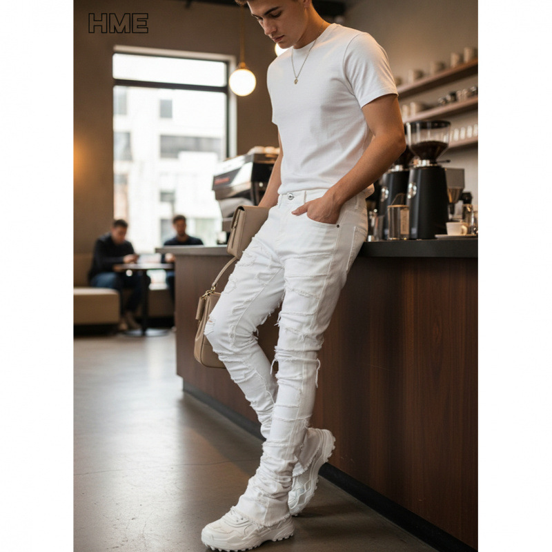 Overseas European and American Men's White Stacked Frayed Denim Jeans with Multi-Layered Ripped Patches, Slim-Fit Skinny Long Pants for Export Overseas European and American Men's White Stacked Frayed Denim Jeans with Multi-Layered Ripped Patches, Slim-Fit Skinny Long Pants for Export