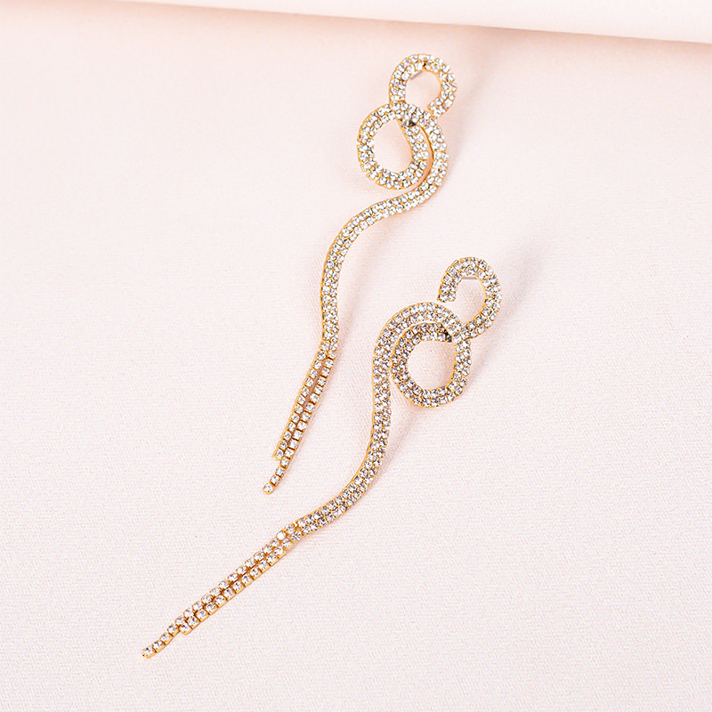 European And American New Alloy Diamond-studded Long Winding Geometric Earrings display picture 3