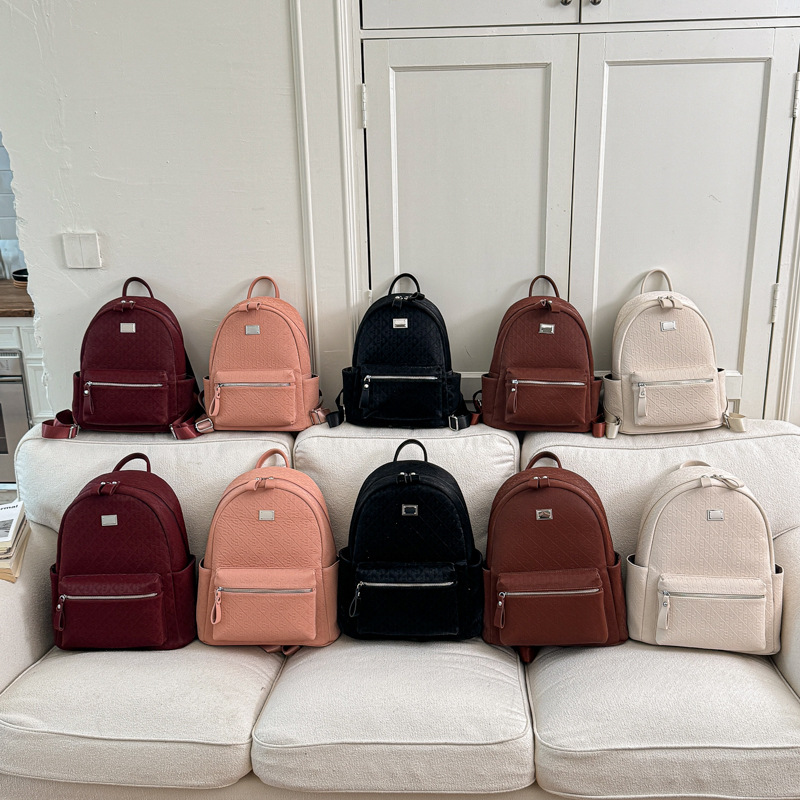 Mochila de moda coreana para mujeres simple color sólido mochila de viaje de gran capacidad 2026 nueva mochila de viaje al trabajo