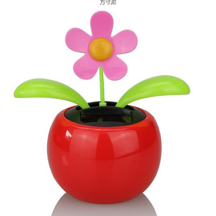 Send pad solar automatic swing head apple flower decoration car ornaments car center console a wholesale