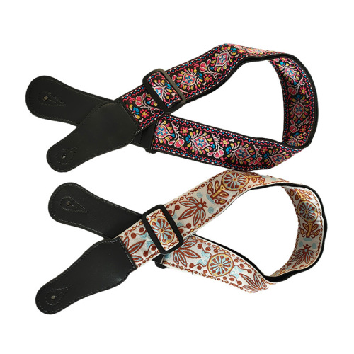 Factory-direct supply of musical instrument accessories—wholesale thickened and widened instrument straps, featuring ethnic-style woven ribbon with embroidered guitar straps.