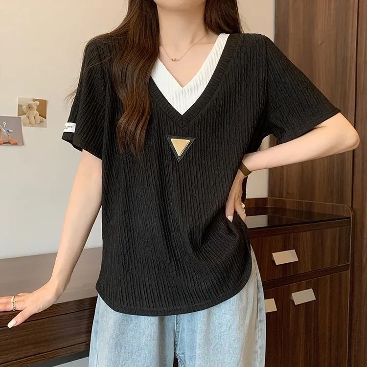 Camiseta de manga corta con sentido de la textura para mujer verano nuevo estilo de gran tamaño suelto y delgado falso diseño de dos piezas con sentido de la blusa casual de todo fósforo