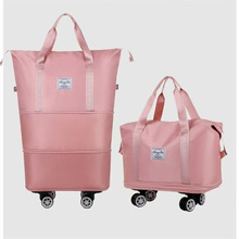 大容量旅行袋行李袋手提短途出差万向轮收纳旅行包登机待产滑轮