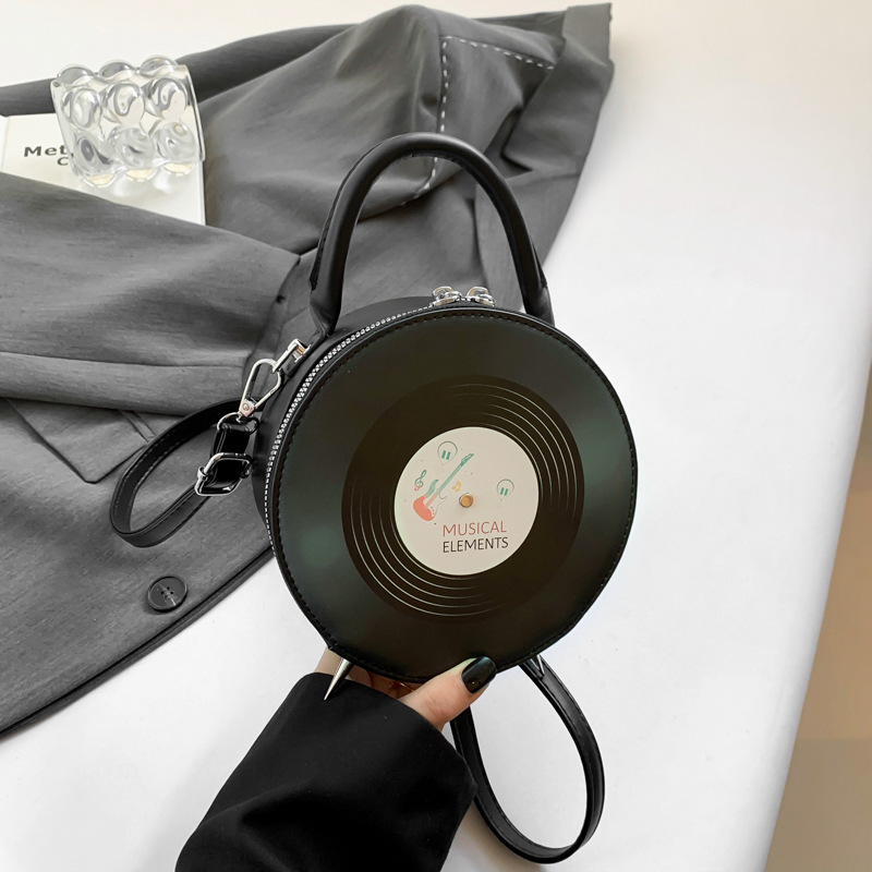 2024新款日系圆形包黑胶唱片包光盘手提单肩包复古街拍CD包