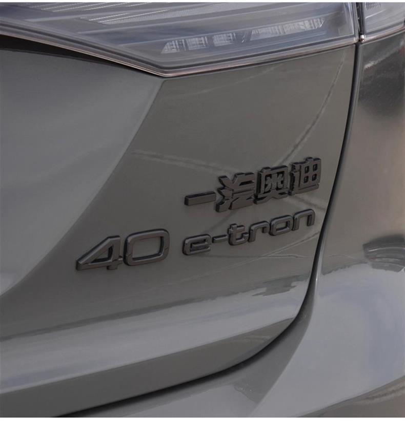 Suitable for Audi new energy vehicle emblems, Q2L, Q4, Q6, and e-tron models; also for modifying the rear emblems of Audi vehicles