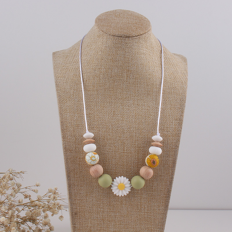 Fábrica nueva margarita collar de mordedor bebé palo molar collar de silicona collar madre