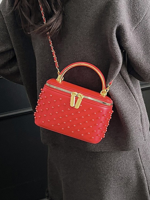 Caja de mano de alta sensación, bolso cuadrado pequeño para mujeres 2026 nueva moda transfronteriza nicho de moda ligero de lujo cadena mochila