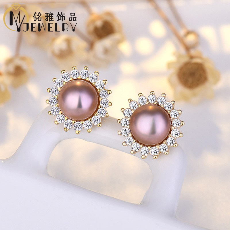 Small sophisticated elegant earrings from pearl solar-powered