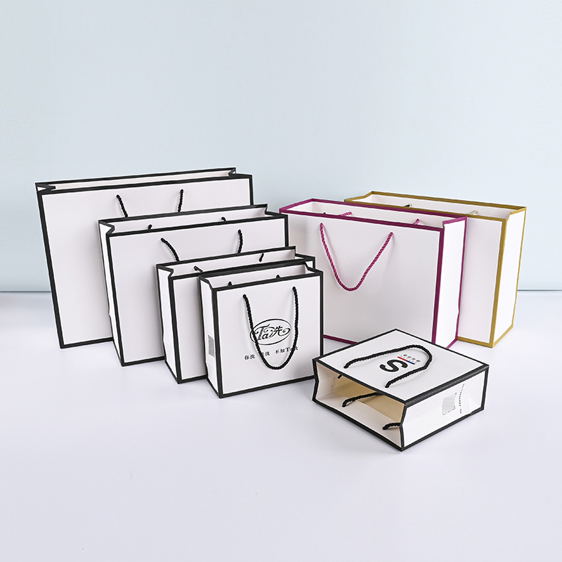 现货批发纸袋 服装手提袋 白卡纸时尚黑边珠宝礼品购物袋可印logo