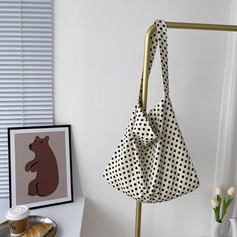 Diseño nicho bolsas de lona para mujeres 2025 nueva gran capacidad coreana estampado de leopardo flor de hombro impresa bolsas de mujer