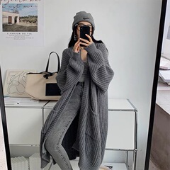 クロスボーダーの外国貿易の長いタイプの太い毛糸のコートの女性の春秋の新型の怠惰な風のゆったりしている純色の百合のニットのカーディガン