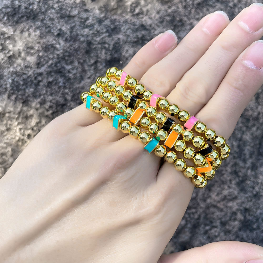 European and American cross-border fashion color dripping oil copper gold round beads bracelet