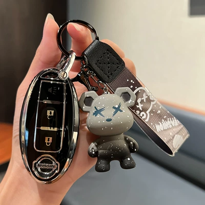 Suitable for Nissan Teana Key Case Qijun Qashqai Xuanyi Tuda Loulan Bag Key Case Unisex (Car key bag) - nissan-b-smart-3-key-single-shell-black-grey-violence-bear-pendant