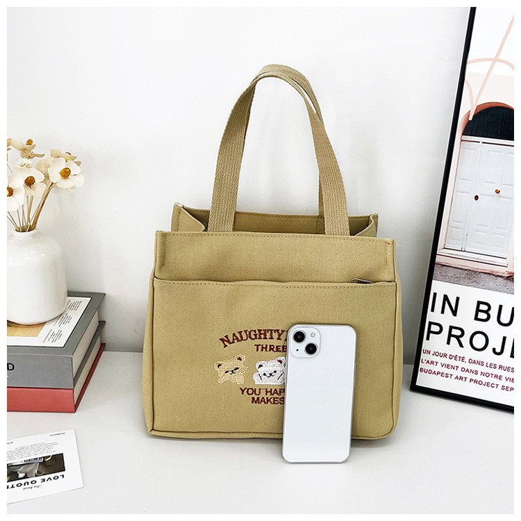 New wholesale fashionable and high-quality canvas handbag, simple and portable, easy to carry for going out, versatile lunch box and bento bag undefined