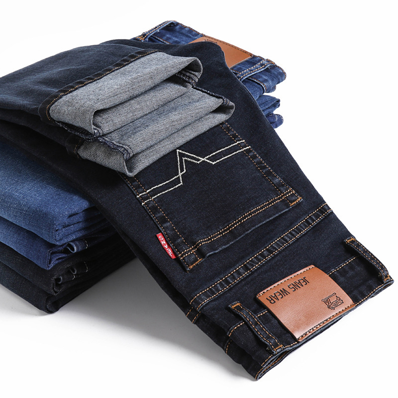 Ventas directas de fábrica de jeans para hombres Versión coreana de pantalones de mezclilla Xintang casuales elásticos de negocios para hombres de talla grande