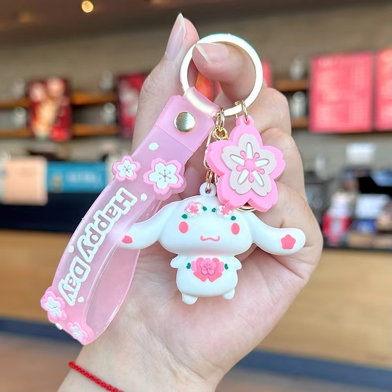 Perro de orejas grandes Melody KT gato pudín perro Kolomi caricatura de silicona llavero colgante bolsa colgante caja ciega regalo