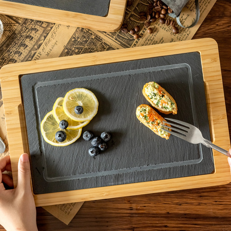 Fábrica de tamaño directo estilo personalizado tablero de bambú tablero de roca plato de comida occidental madera tablero negro plato de horneado