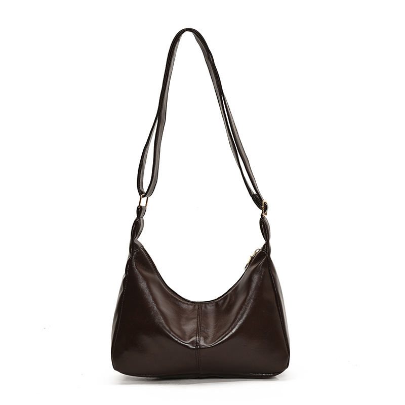 Color sólido textura de cuero suave hombro mochila para mujeres 2025 primavera nueva literatura y arte bolsos casuales bolsos especiales de moda