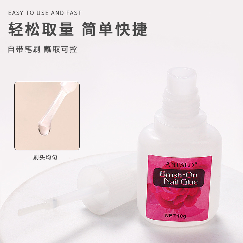 Suministro directo transfronterizo pegamento de uñas 10g con cepillo pieza de uñas falsas rhinestone accesorios de pegamento de esmalte de uñas para salón de uñas