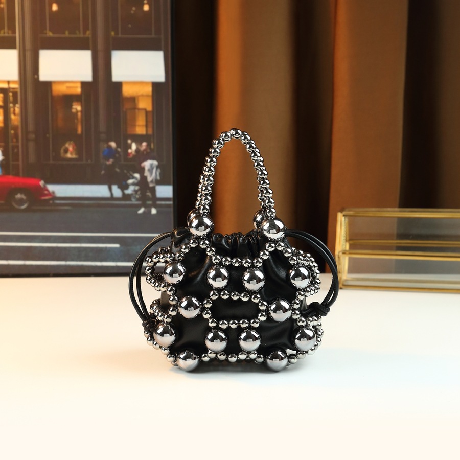 Nuova borsa da donna con design a nicchia in metallo traforato, borsa a secchiello alla moda per feste serali, stile popolare_voghion.com
