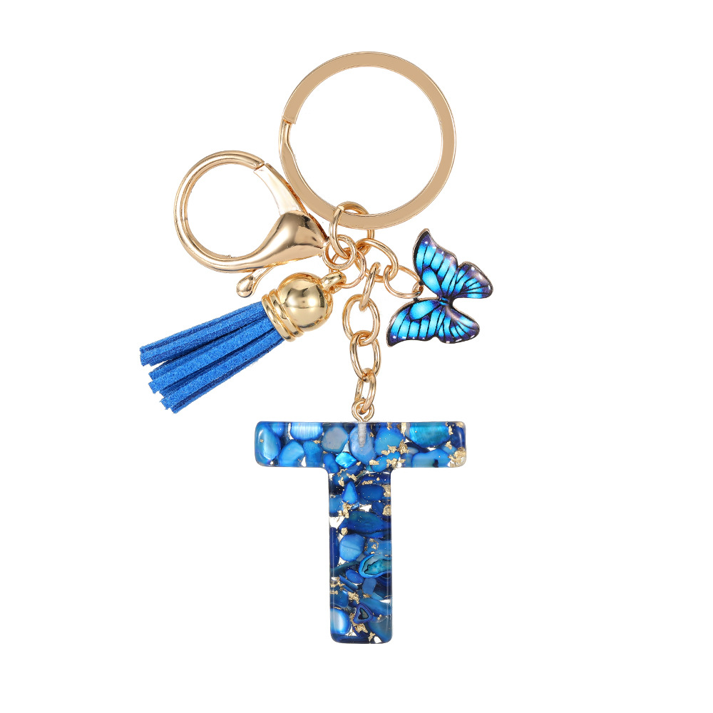 Nuevo transfronterizo mariposa 26 letras inglesas de cristal goteo llavero bolsos accesorios colgante de automóviles