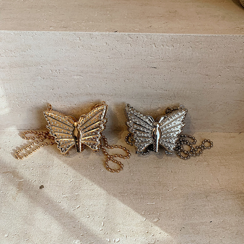 Bolsa de cena de moda mariposa para mujeres 2025 nueva cadena de diamante simple bolso de hombro mini bolso de lápiz labial de diamante