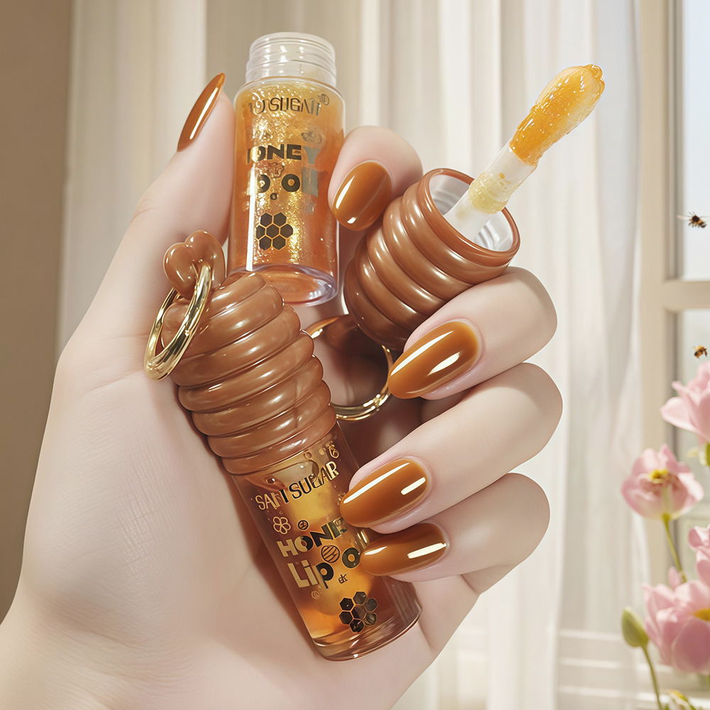 跨境爆款蜂蜜唇蜜唇油 唇部精华保湿滋润带钥匙扣可挂包上嘟嘟唇