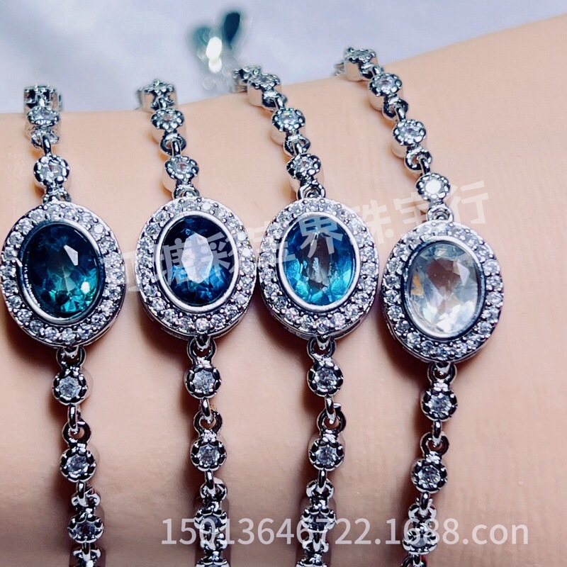 Natural Topaz Bracelet with Four Semi-Silver Main Stones, Oval-Shaped, with a Gradient from Dark Blue to Light Blue, Outer Ring Natural Topaz Bracelet with Four Semi-Silver Main Stones, Oval-Shaped, with a Gradient from Dark Blue to Light Blue, Outer Ring