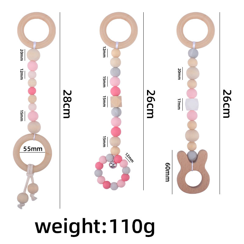 Nuevo Bebé calmante juguetes traje bebé cuentas de silicona haya molares mordedor juguetes pequeña campana Amazon