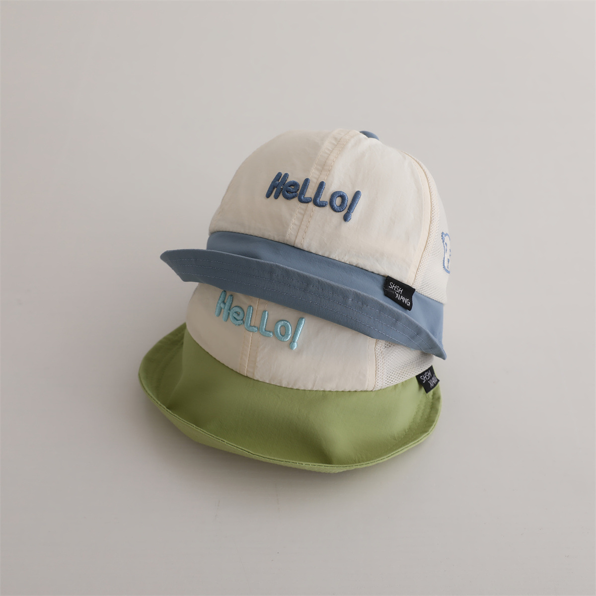 Sombrero para bebés de verano delgado bebés secado rápido gorro de pescador de lengua de pato de malla coreana gorra de protección solar para niños y niñas
