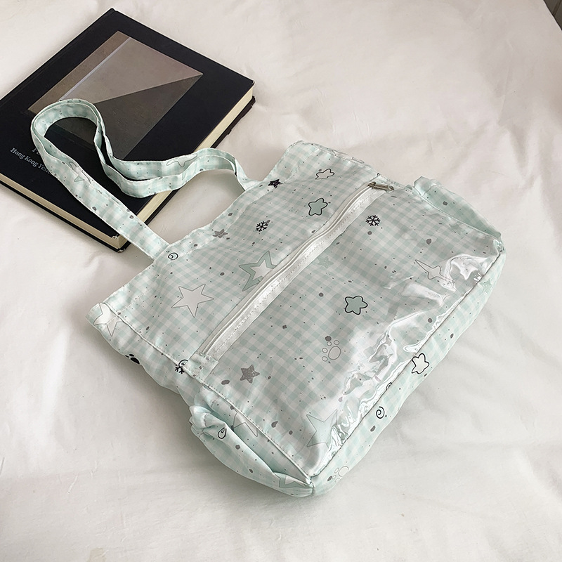 Bolso japonés simple y versátil transparente pequeño fresco estampado dulce 2025 niña dibujos animados leche huhutote bag